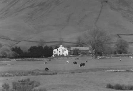 The Wasdale Head Inn, home of the Great Gable Brewery, with Kirk Fell as a backdrop.