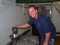 Heriot Watt student David Birch adds finings direct to cask before dispatch