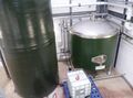The 300hL raw water tank on the left with acid dosing and the cold liquor tank in the corner