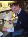 Brewer Ian Burgess completes his paperwork