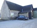 The brewery buildings, a Cotswold stone barn repurposed