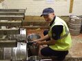 Quality Improvement Manager Alistair Dickson changes a cask