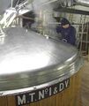 The 1.5 tonne mash tun is wooden clad with a stainless top