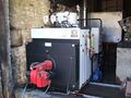 Steam is supplied from an oil fired ICI Caldiae one million BTU unit