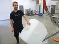 Jake Griffin washes a 300L poly vessel from the Studio