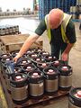 Drying the keg surface before applying export labels - the beer is Bass Pale destined for Japan
